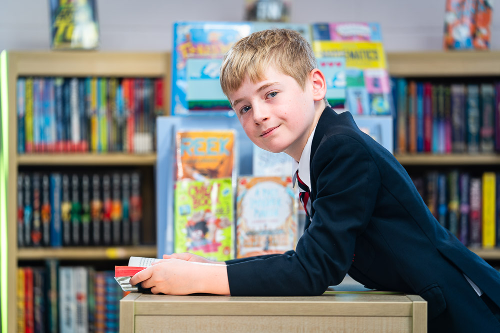 A pupil in the school library