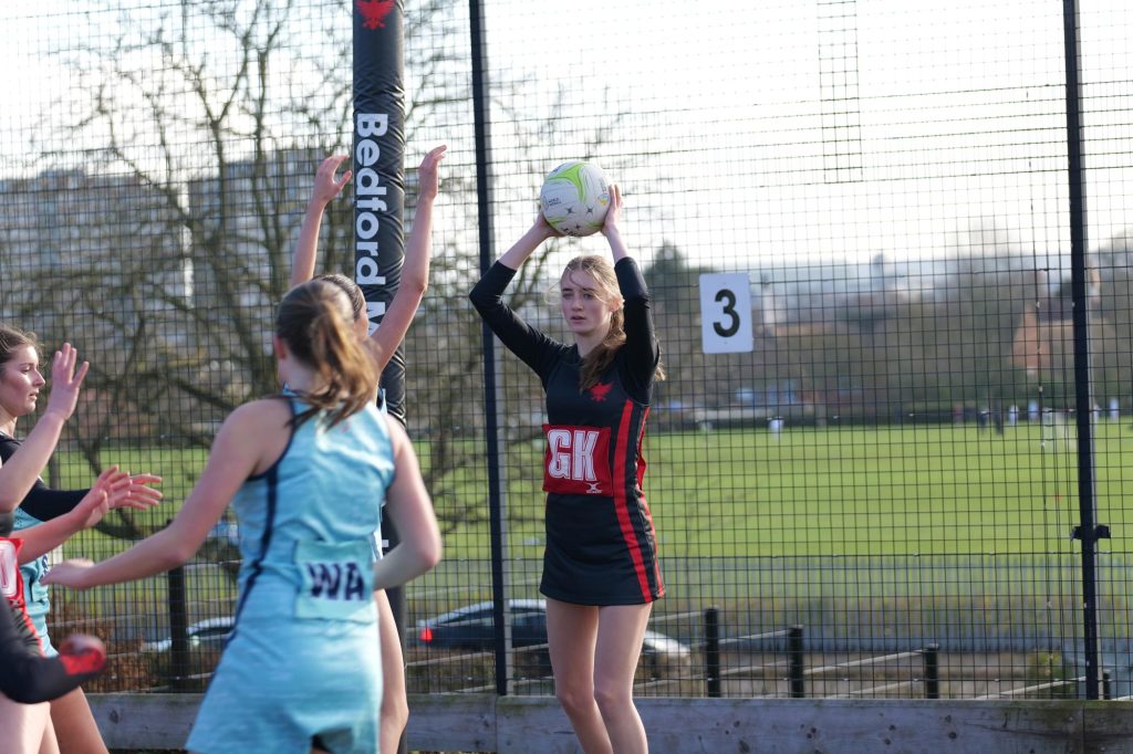 Pupils competing during a netball match
